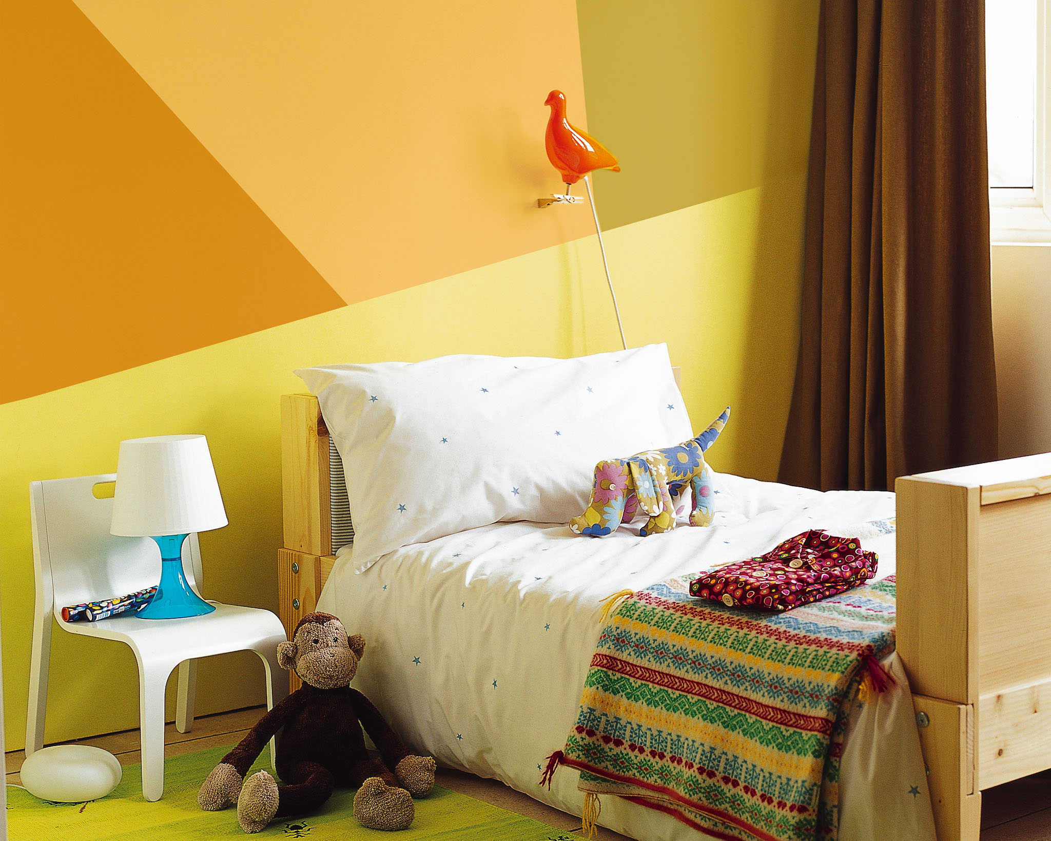 Colourful geometric shapes on walls Paint your child’s walls with colourful geometric shapes.